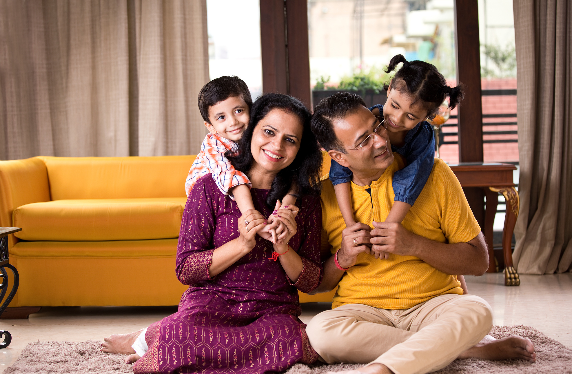 Happy Indian family at home